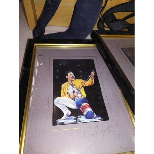 134 - 4 framed and signed pictures of Freddie Mercury.