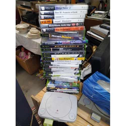 163 - A large selection of gaming. 2 PlayStation 1's, games, a PS3, 2 Xbox 360's, 3 Nintendo DS's, DS game... 