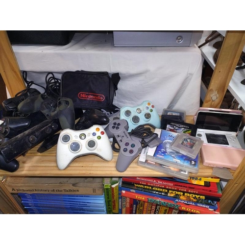 163 - A large selection of gaming. 2 PlayStation 1's, games, a PS3, 2 Xbox 360's, 3 Nintendo DS's, DS game... 