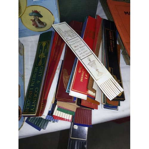 225 - A tin of leather bookmarks