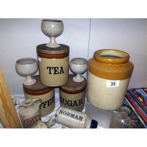 35 - A quantity of stoneware bottles and jars