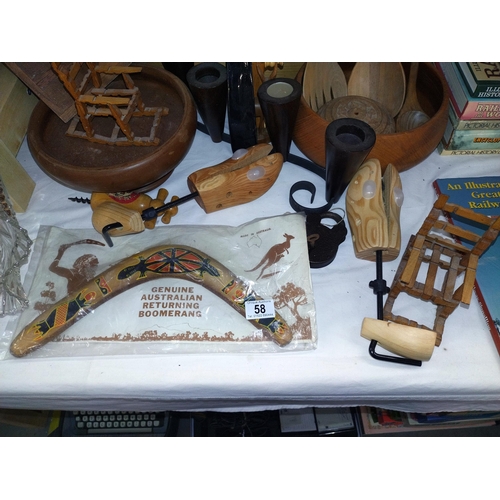 58 - A quantity of treen/wooden items including shoe lasts, boomerang, inlaid plaque etc