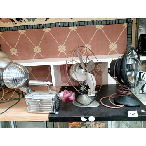 141 - A Handy Breeze 1930's working fan, heater & a Pifco chrome emergency lamp