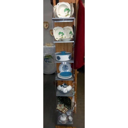 187 - A 7 shelf mix of early 20th century ceramics including tea sets etc