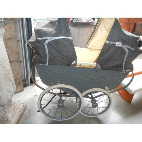 2951 - A mid 20th century twin baby/doll pram, for restoration. COLLECT ONLY.