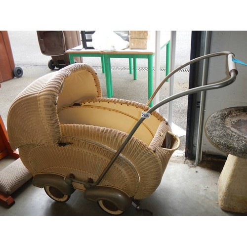 2955 - A circa 1920/30's wicker Lloyd Loom style baby pram. COLLECT ONLY.