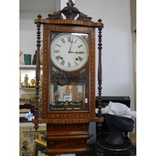 2957 - A good quality mahogany inlaid wall clock in good condition but missing pendulum, COLLECT ONLY.