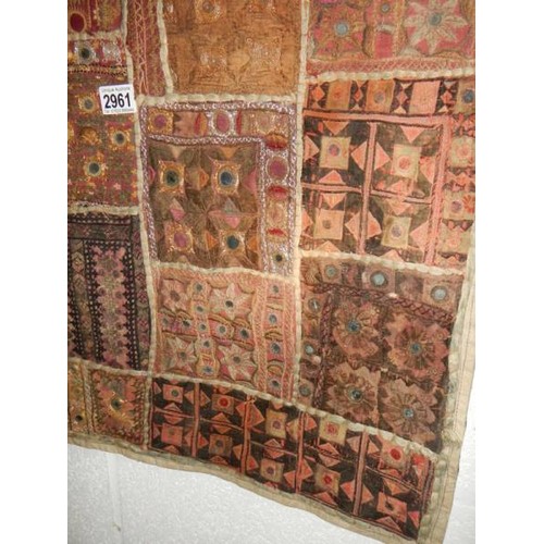 2961 - An early Rabari patchwork wall hanging with mirrored discs (91.5 x 163.5 cm)