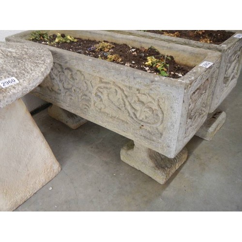 2962 - A garden planter with decoration on sides, 17 x 80 x 44 cm high. COLLECT ONLY.