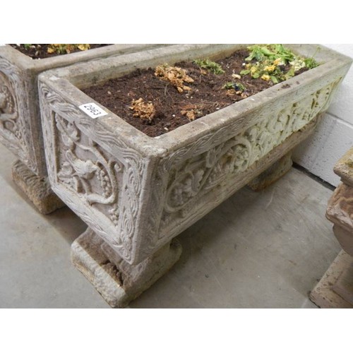 2963 - A garden planter with decoration on sides, 17 x 80 x 44 cm high. COLLECT ONLY.