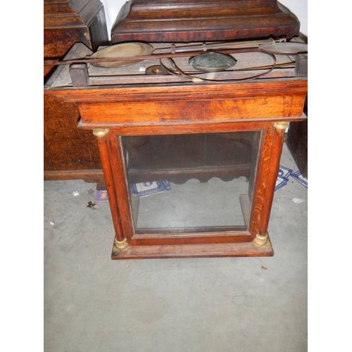 2969 - A good oak cased Grandfather clock case with spare hood and 4 spare pendulums, COLLECT ONLY.