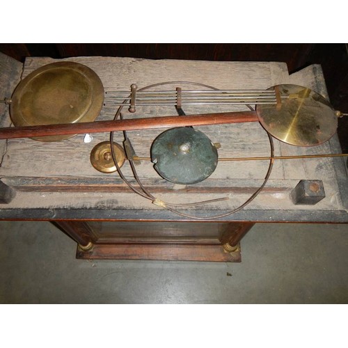 2969 - A good oak cased Grandfather clock case with spare hood and 4 spare pendulums, COLLECT ONLY.