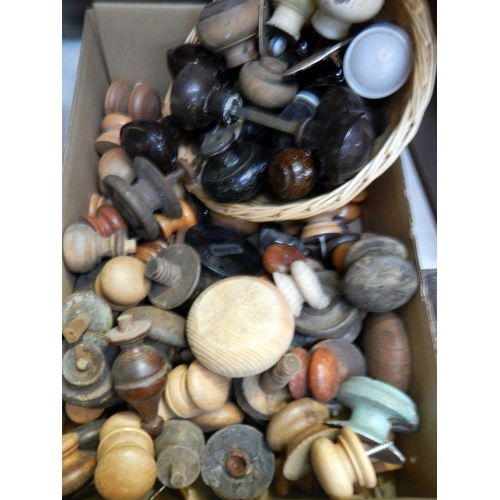 1014 - A box of wooden drawer knobs & door handles