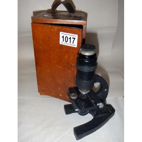 1017 - A mahogany boxed BN JP.S London microscope