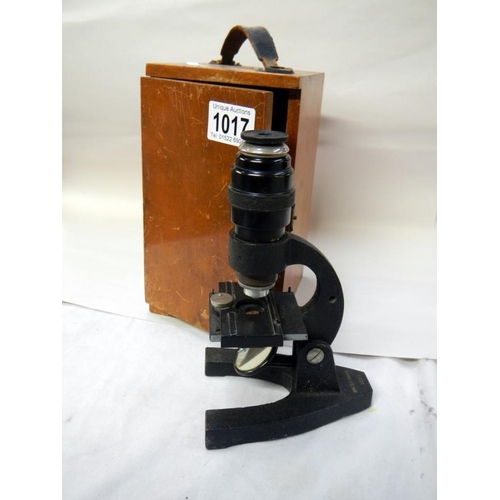 1017 - A mahogany boxed BN JP.S London microscope