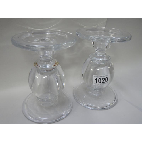 1020 - 2 heavy glass candlesticks