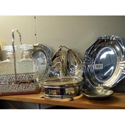 1031 - A quantity of plated items including decanter etc.