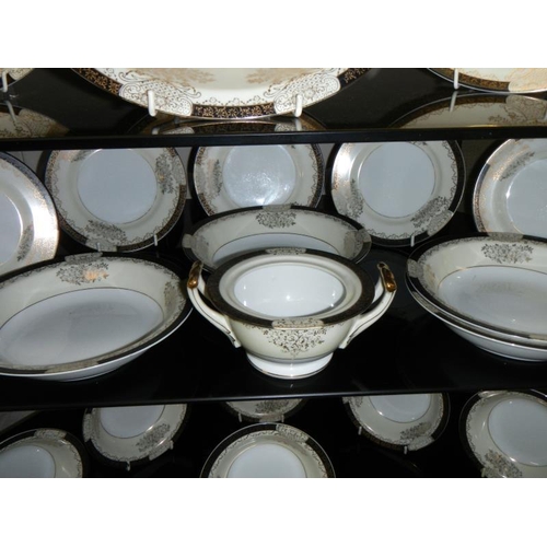 1051 - A large collection of Kutani dinnerware.
Collect Only.