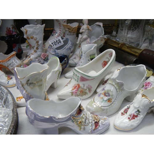 1058 - A good selection of collectors china shoes.
Collect Only.