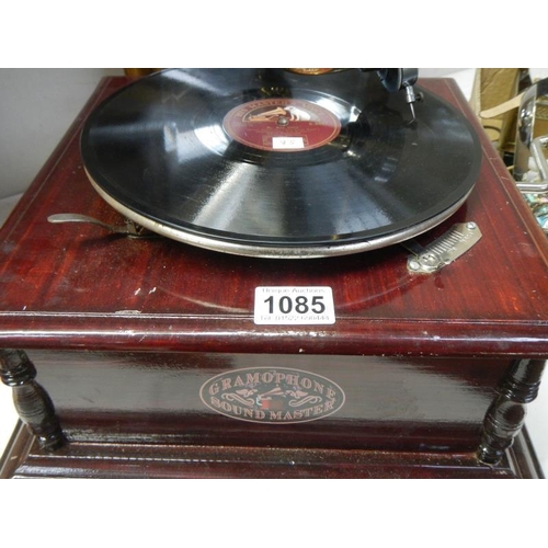 1085 - A horn gramophone with brass horn,  in working order COLLECT ONLY