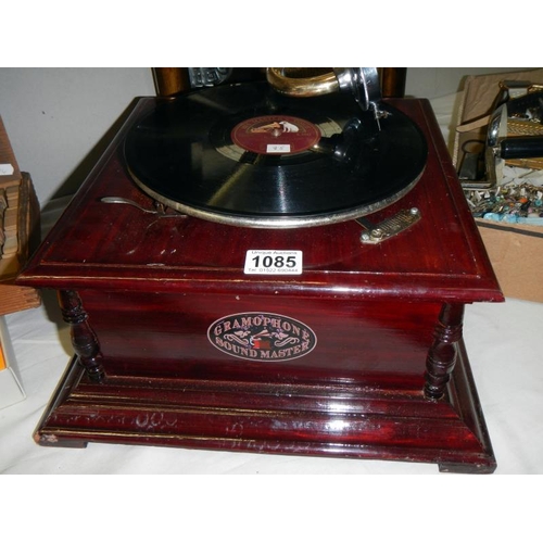 1085 - A horn gramophone with brass horn,  in working order COLLECT ONLY