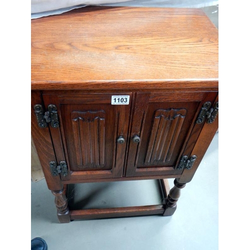 1103 - A linen fold 2 door oak cabinet in good order.
Collect Only.