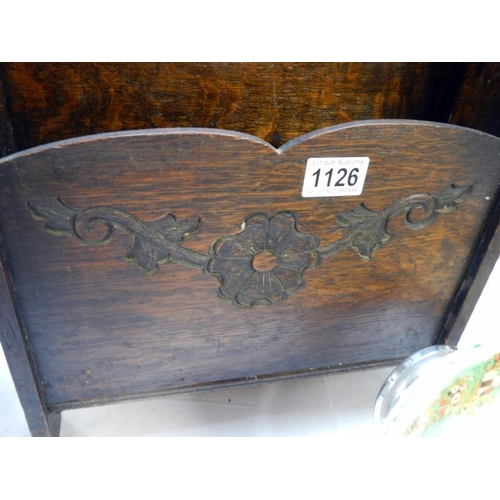 1126 - A 20th century oak magazine rack