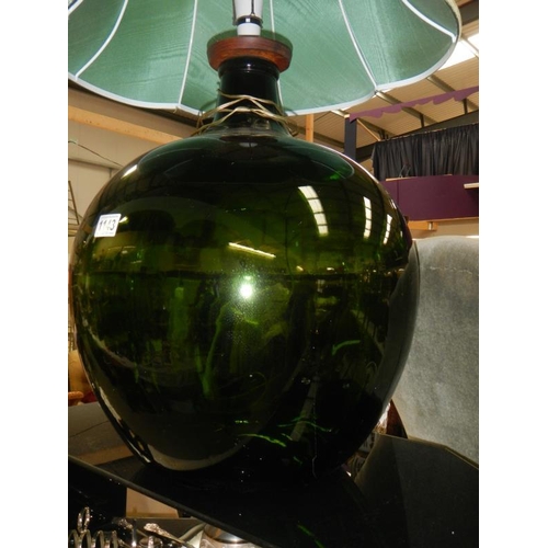 1143 - A large green carboy made into a table lamp
Collect Only.