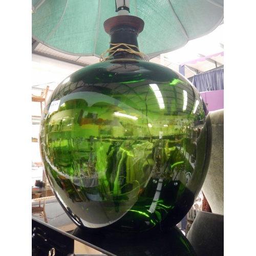 1143 - A large green carboy made into a table lamp
Collect Only.