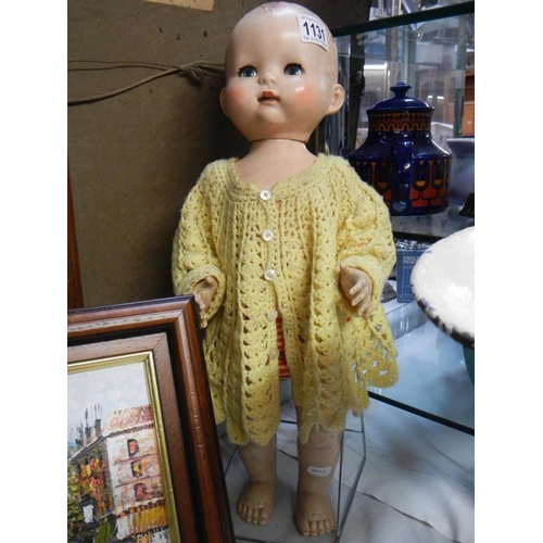 1131 - A mid 20th century doll with moving arms & legs