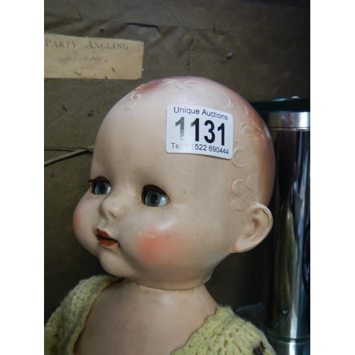 1131 - A mid 20th century doll with moving arms & legs