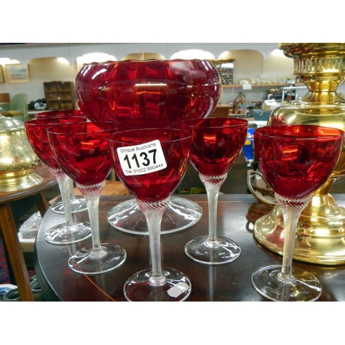 1137 - A set of 6 cranberry twisted stem glasses & large cranberry bowl
Collect Only.