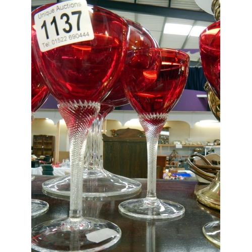 1137 - A set of 6 cranberry twisted stem glasses & large cranberry bowl
Collect Only.