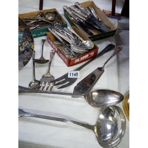 1140 - A collection of silver plate cutlery including ladle