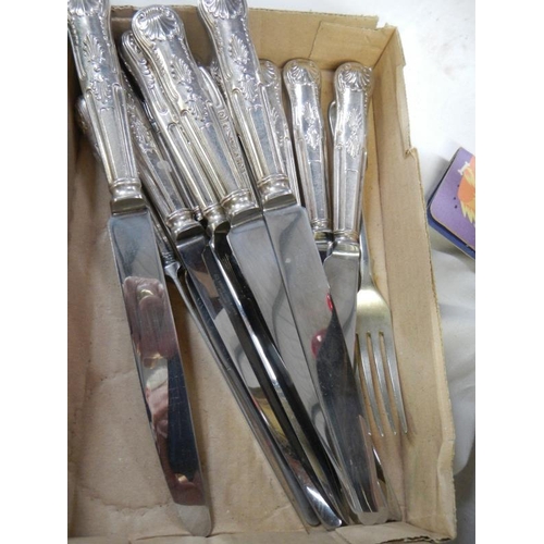 1140 - A collection of silver plate cutlery including ladle