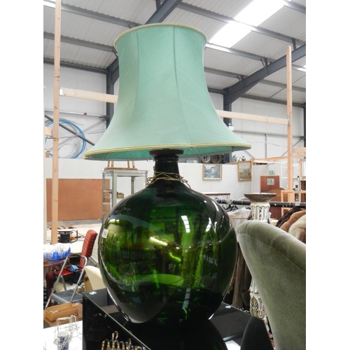 1143 - A large green carboy made into a table lamp
Collect Only.