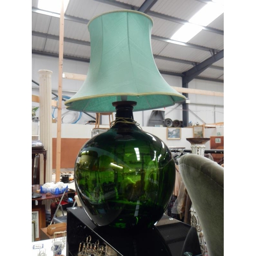 1143 - A large green carboy made into a table lamp
Collect Only.