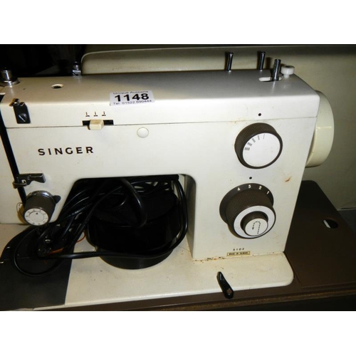 1148 - A Singer sewing machine.
Collect Only.