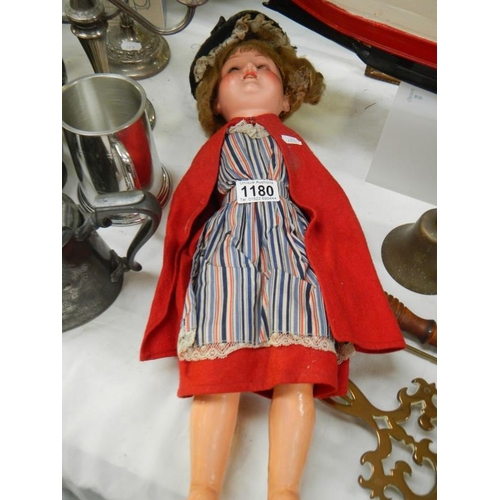 1180 - An early 20th century doll in good order