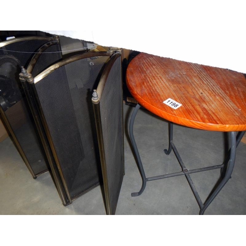 1198 - A round metal leg wooden top table & 4 fold fire screen. Collect Only.