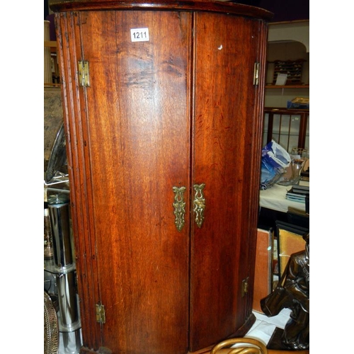 1211 - An early Victorian bow front corner cupboard.
Collect Only.