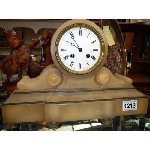 1213 - A French alabaster mantle clock in working order