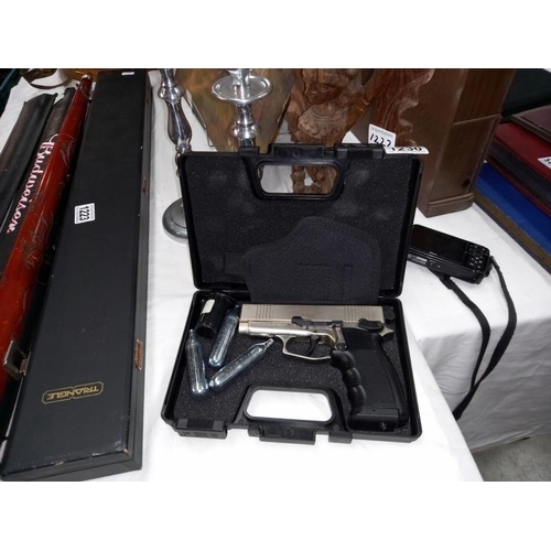 1230 - A cased BB pistol, complete