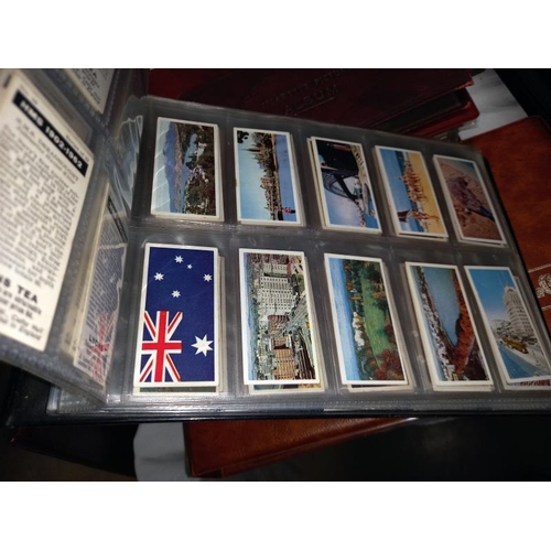 1235 - 5 albums containing tea cards, plus many sets