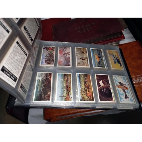 1235 - 5 albums containing tea cards, plus many sets