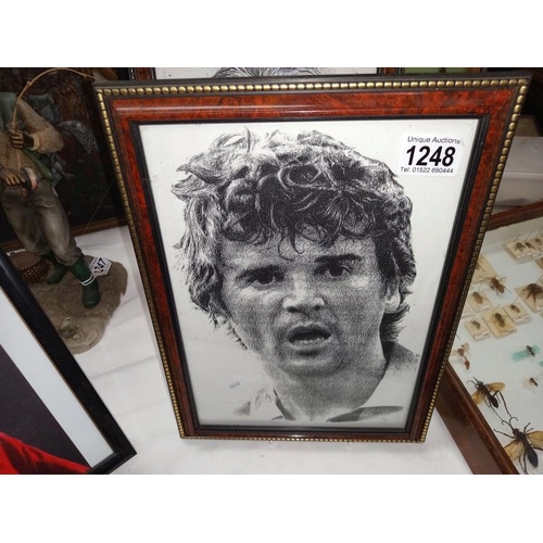 1248 - A collection of framed footballer pictures