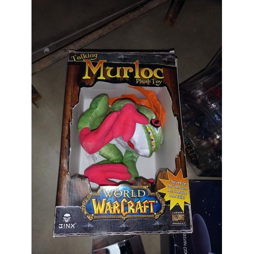 1264 - A quantity of World of Warcraft action figures, other action figures and Talking Murloc