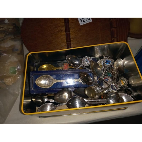 1270 - A collection of silver plate collectors spoons and 3 display racks