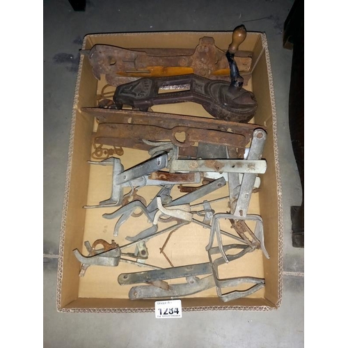 1284 - A quantity of vintage mole traps and ice skates & cast iron bean slicer