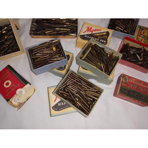 1335 - A collection of old pen nibs in collector boxes